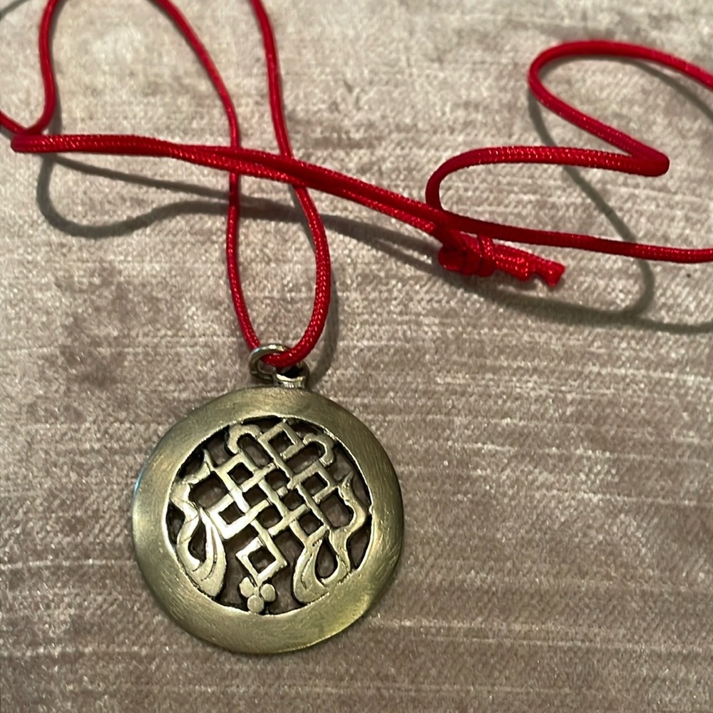 Vintage Sterling Silver Good Luck Medallion Rare on red silk cord
